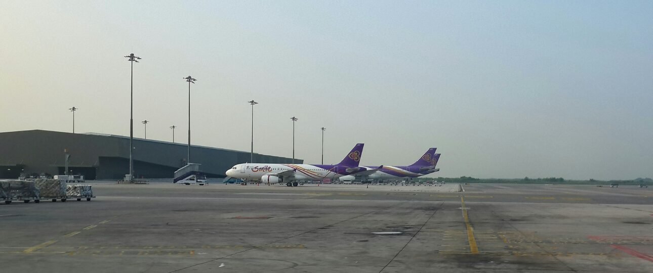 Hat Yai Airport terminals with Thai Airways planes