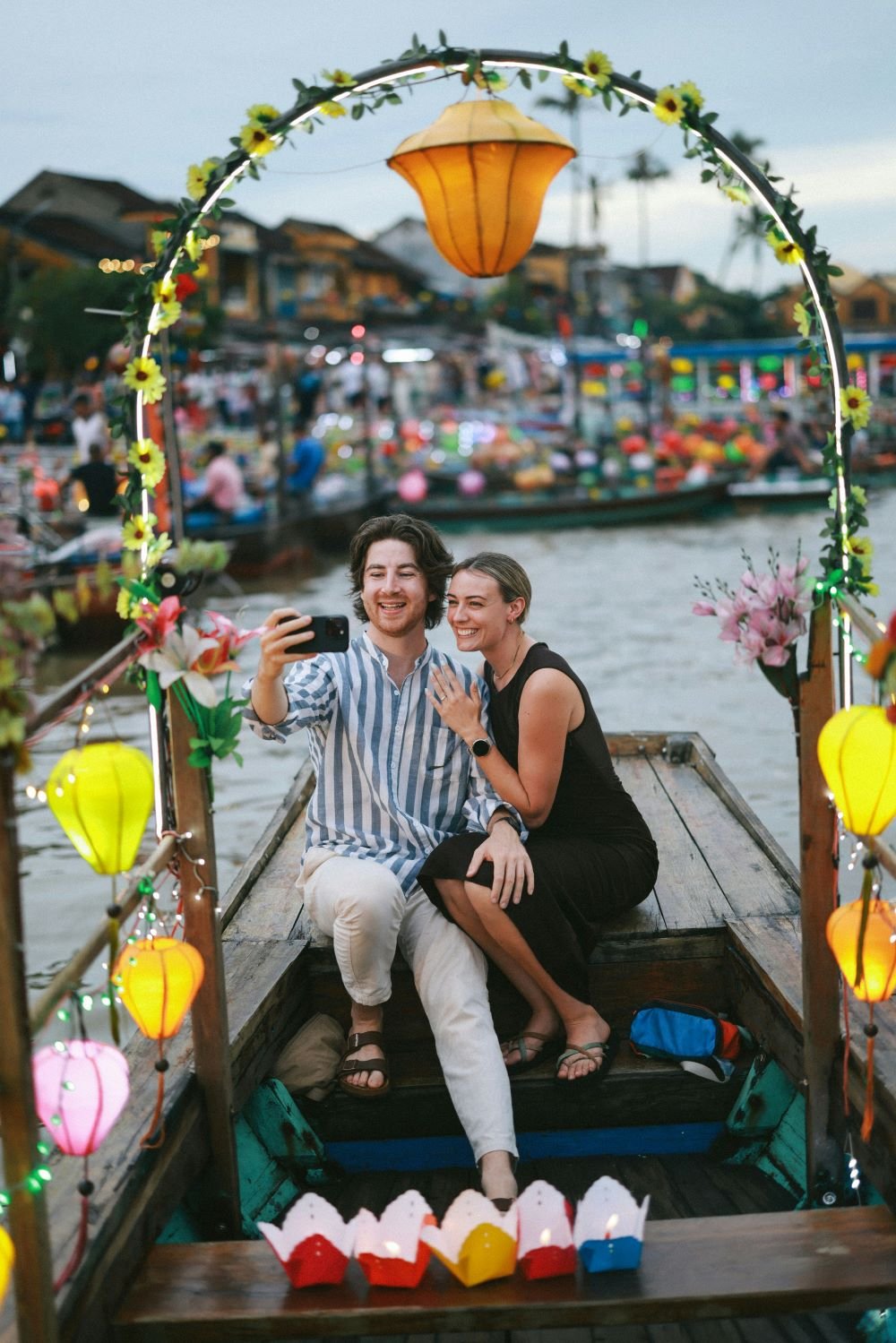 Couple taking selfie at Khlong Hae Floating Market Hat Yai